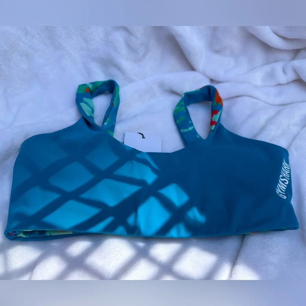 NWT- Gymshark blue/green/red reversible bikini‎ top.
